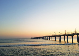 Fototapeta na wymiar Sea pier at sunset. Anapa, Dzhemete