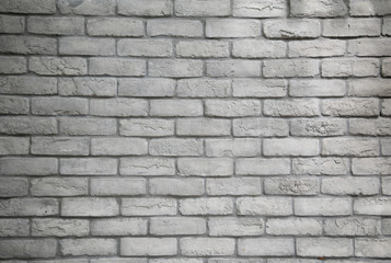 Modern white grey brick wall textured background.