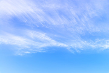 Obraz premium Blue sky and white fluffy tiny clouds background and pattern