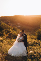 a walk of the newlyweds at sunset of the day