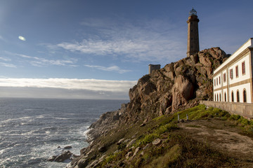 Fototapeta na wymiar cape vilan with one of the oldest lighthouses on the coast of death (costa de morte) in galicia, spain