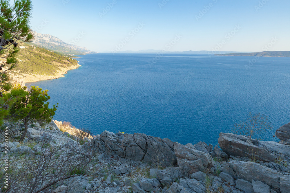 Wall mural View of the shores of the Adriatic Sea and the Biokovo Mountains in the background in Croatia