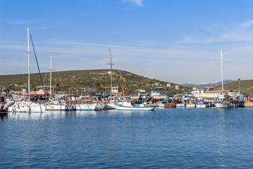 Fototapeta na wymiar Izmir, Turkey, 3 April 2010: Marina of Sigacik with boats