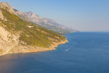 View of the shores of the Adriatic Sea and the Biokovo Mountains in the background in Croatia