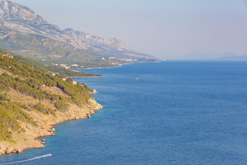View of the shores of the Adriatic Sea and the Biokovo Mountains in the background in Croatia