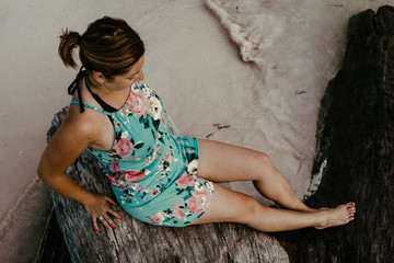 Female Caucasian brunette in a bathing suit bikini on the beach in Jamaica  