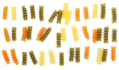 set colorful Italian spiral shaped pasta, macaroni set, isolated on white background, top view