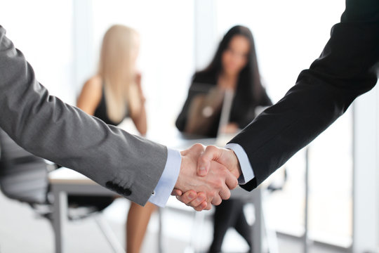Handshake on business meeting