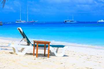 Sunbathing on the sunbed against the sea