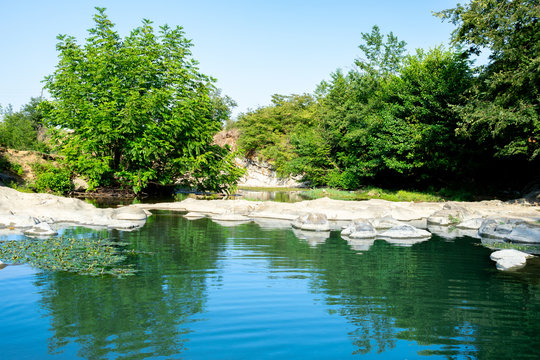 flowing through the forest, a quiet stony and rocky river. beautiful view of nature. Azerbaijan Lerik