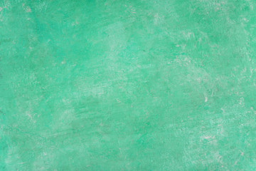 Green and cyan pastel color wall vignette texture abstract background.