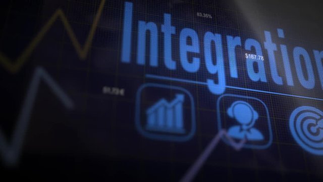 A Integration business concept on a flashing computer monitor with moving graphs and data.