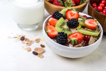 Granola with strawberry and kiwi. Healthy breakfast.