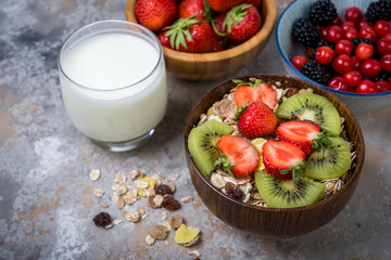 Granola with strawberry and kiwi. Healthy breakfast.