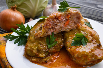 cabbage rolls on a wooden gray rustic background