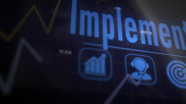 A Implement business concept on a flashing computer monitor with moving graphs and data.