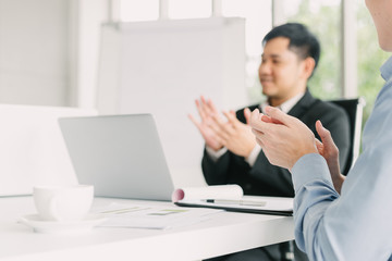 businessman applauding after meeting