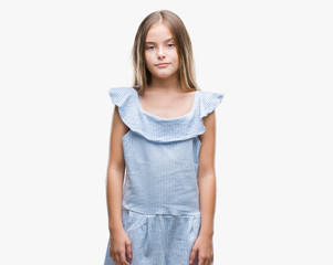 Fototapeta premium Young beautiful girl over isolated background with serious expression on face. Simple and natural looking at the camera.