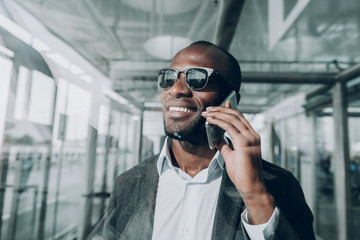 Good news. Close up portrait of guy having working call. He feeling happy about good news from his colleague