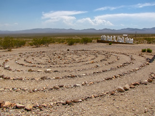 White ghosts and stones laid out in circuleren, Rhyolite ghost town, Death Valley, Nevada, USA