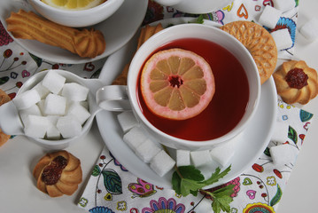 fruit tea with cookies with marmalade