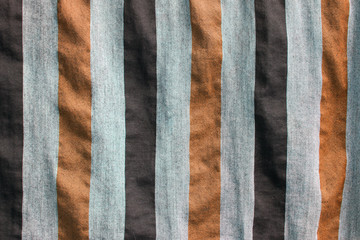 Pieces of fabric or canvas with strip pattern in vertical line