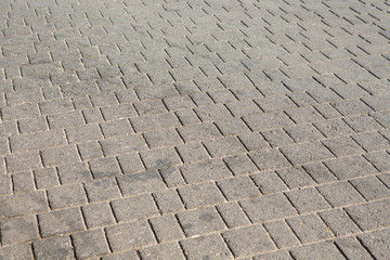 brick paving stones on a sidewalk background texture