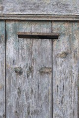 mailbox on old wooden door