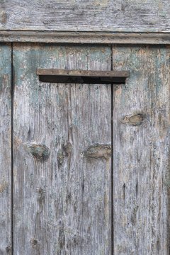 mailbox on old wooden door