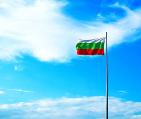 flag of Bulgaria waving in the wind, blue sky background
