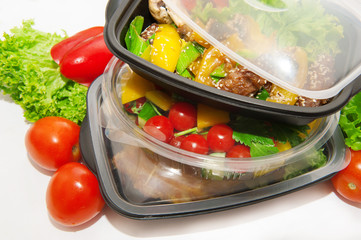 Chicken with lettuce and vegetables in lunchbox