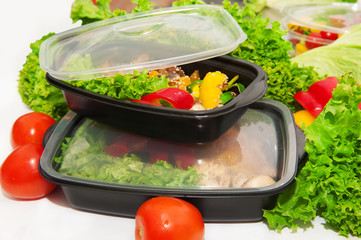 Chicken with lettuce and vegetables in lunchbox