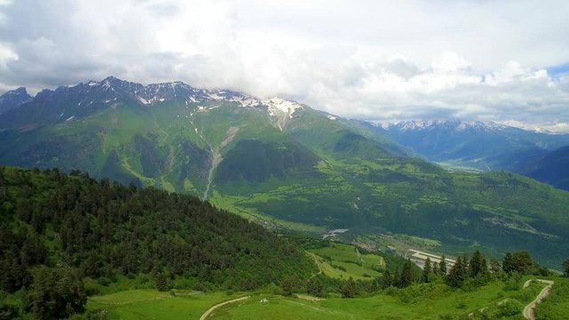 drone view  of Mestia in valley and mountain with cloud from observation deck