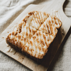 Toast with Sweetened condensed milk on a cutting board