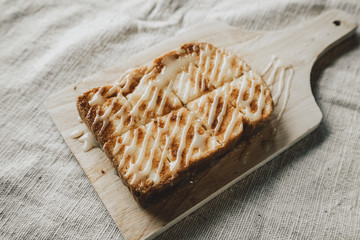 Toast with Sweetened condensed milk on a cutting board