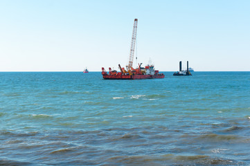 Obraz premium Marine petroleum platform. Drilling rig oil rig at sea. A drilling rig in the sea. Offshore oil wells.