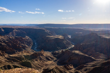 blue sky clouds namibia fishriver canyon landscape