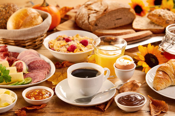Table covered by assorted food and beverages