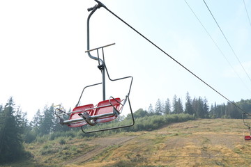 chair lift in mountains