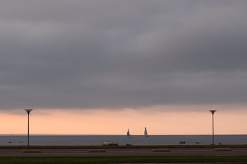 Fototapeta na wymiar Sails at dusk