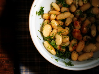 Salad from boiled string beans. Salad on the table.