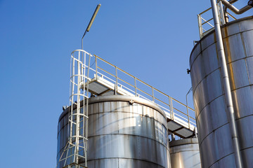 Stainless storage tanks in chemical industry . .metal detail