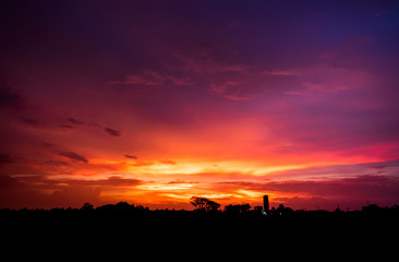 Beautiful sunset with blue sky and clouds background.