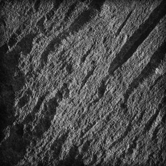 Texture of stone surface. Dark grey black slate background.