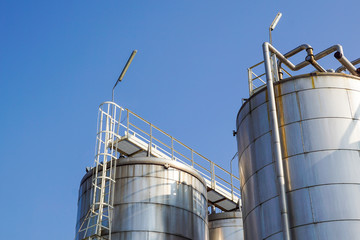 Stainless storage tanks in chemical industry . .metal detail