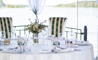 Wedding table setting. Preparation for the celebration dinner