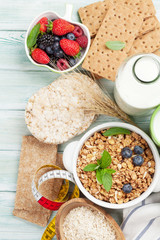 Healthy breakfast set with muesli, berries and milk