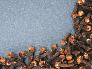 Cloves on slate background