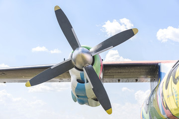 Naklejka na ściany i meble Aircraft engine on the wing of the aircraft