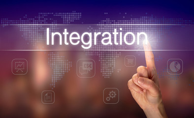 A hand selecting a Integration business concept on a clear screen with a colorful blurred background.